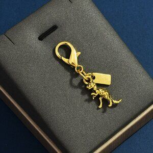 dinosaur bag charm for coach bag